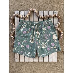 Marine Layer 6” Mechanical Stretch Swim Trunk Shorts in Green Floral